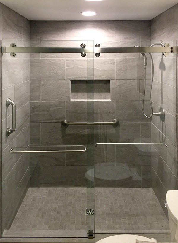 C.R. Laurence Frameless Bypass Sliding Shower Door System | Commercial